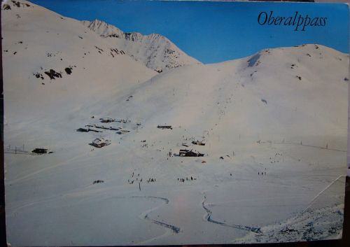 Postkarte "Oberalppass 2048m mit Piz Calmot, Gasthaus Passhöhe-Hospiz, Fam. Soliva, Oberalp (Grb.), Tel. 086 / 7 71 16 - 2048 m.ü.M." (Rud. Suter, Oberrieden-Zch., Nr. 18202) - Archiv Talstation Skilift Alpsu
